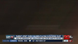 Parent outraged over students playing outside in blowing dust