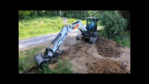 Installing 12" culvert pipe with bobcat e42 mini excavator PT 1