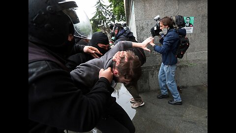 Riot police move in with water cannon after protesters break through barriers