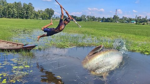 Village Bamboo Arrow Bow Fishing Technique With Boat In River Side