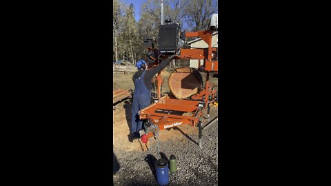 Cutting Doug Fir boards on the Woodmizer