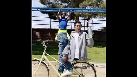 Magic prank, man cut in half on a bike