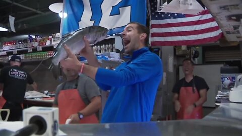 What a catch! Watch our reporter's sweet grab at a Seattle fish market