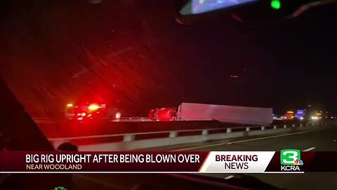 Big rig hangs over Yolo Bypass on I-5