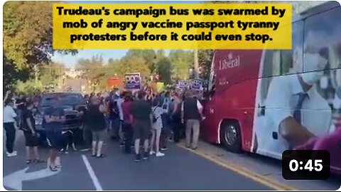 Trudeau's campaign bus swarmed by protesters before it could even stop.