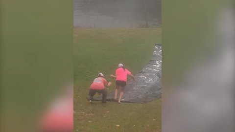 Homemade Slip-N-Slide Makes The Best Of A Rainy Day