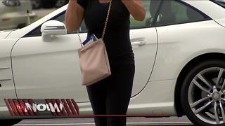 Woman says across the body purse saved her life