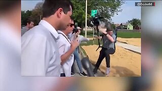 Cameraman takes a tumble on the job