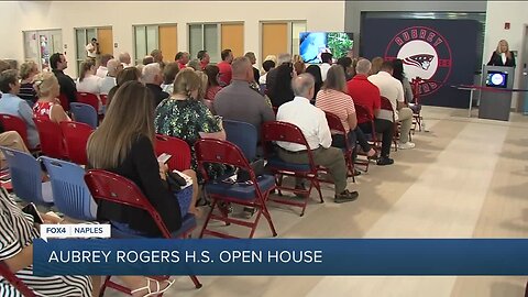 Aubrey Rogers ribbon cutting