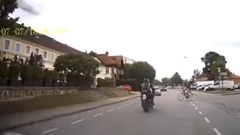 A motorbike hits a cyclist