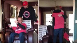 Father can't contain his tears when his son surprises him with a football ticket