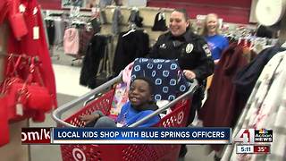 Local kids shop with Blue Springs officers