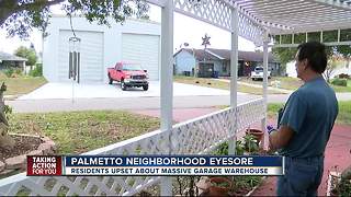 Manatee residents upset after massive garage built between homes