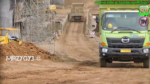 Excavator Dump Trucks Motor Grader Compactor Busy Working On Toll Road Construction