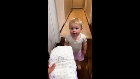 Funny toddler hilariously runs from diaper change