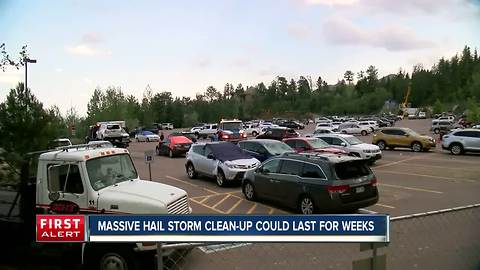 Cleanup underway in Colorado Springs after hail storm pounds city, injuring 14 and damaging property