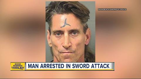 3-foot sword found near victim killed in 'violent attack,' man arrested for murder