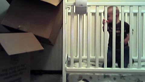 "The Great Crib Escape: A Tot Boy Squeezes Out Through the Bottom of The Mattress"