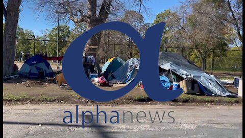 On the ground in a growing Minneapolis homeless camp