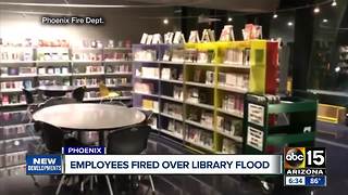 Library employees fired over flood