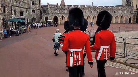 Queen's Guard Shouts make way at women with headphones on #windsorcastle