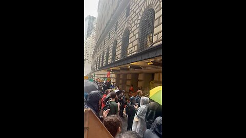 Climate change advocates are obstructing the entrances to the Federal Reserve in downtown Manhattan