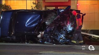 Speeding car crashes into signs, trees