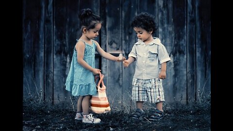 Little girl and boy preciously singsand dance "Love Grows" by Edison Lighthouse