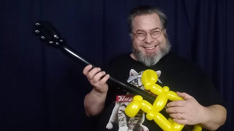 Day 77 - Yellow and Black Attack Balloon Guitar - 365 Days of Balloons