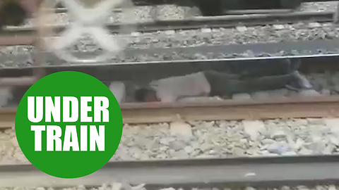 Heart-stopping moment a man was run over by a heavy good train