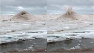 Weird sand formation in Lake Michigan looks like a volcano