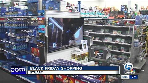 Shoppers wait in long lines for Black Friday deals