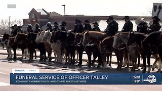 Steve Davis, retired police officer, provides insight on the traditions within law enforcement community during a police funeral service