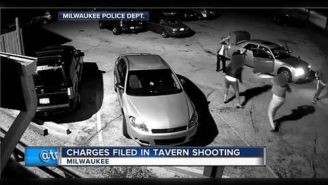 Two charged in tavern shooting