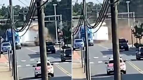 Moment: Tractor Trailer Stuck On Railroad Crossing Smashed To Pieces By Oncoming Train in Carolina