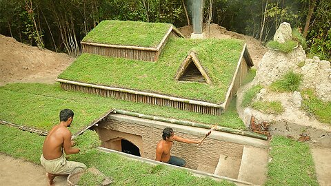 Building underground hut with grass roof fireplace with clay