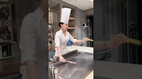 Tall Slender Chinese Girl Is A Teppanyaki Chef That Throws Knives