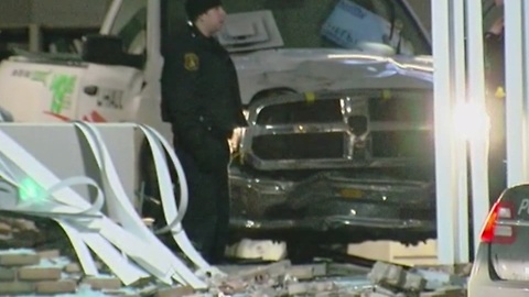 Pickup truck smashes into Secretary of State's office in Redford Township