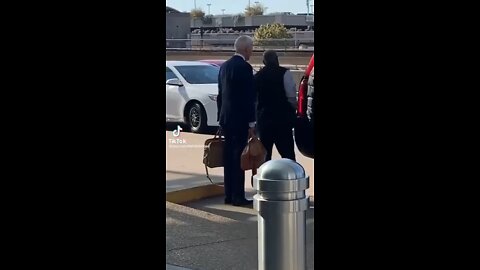 Fake Joe Biden taking an UBER at an airport