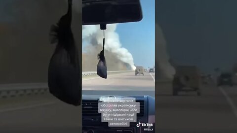 Ukrainian air defense system Buk-M1 being taken out by a Russian helicopter on a busy highway