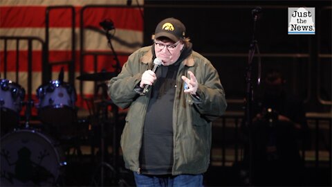 Conservative filmmaker Dinesh D’Souza backs Michael Moore