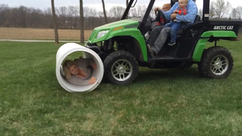 Woman In An Construction Tube vs. Toddler In An ATV