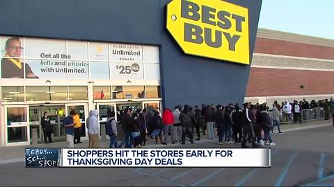 Hundreds brave the cold, lines for Black Friday