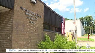 Demonstrators vandalize Baltimore FOP building, burn American flag