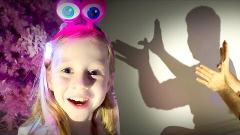 Nastya plays with shadow puppets and glowing toys