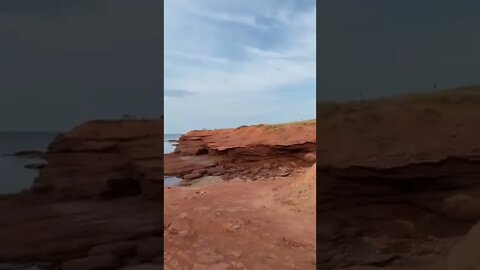 Beautiful red cliffs at the beach in Canada