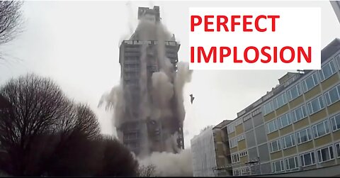 High-rise apartment block implodes, filmed from 4 angles.