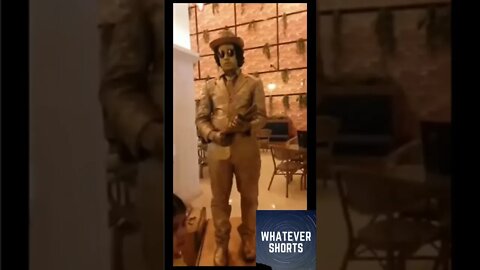 Kid gets retaliation from living statue #shorts #performer #kid #hit #statue