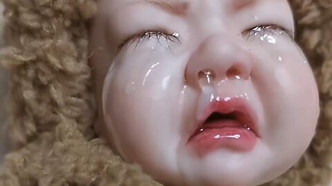 Clay sculpture - Realistic crying baby face made from polymer clay