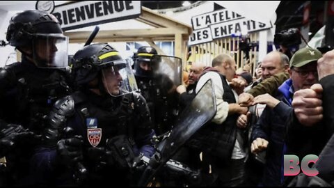 Angry French farmers storm into Paris agriculture fair